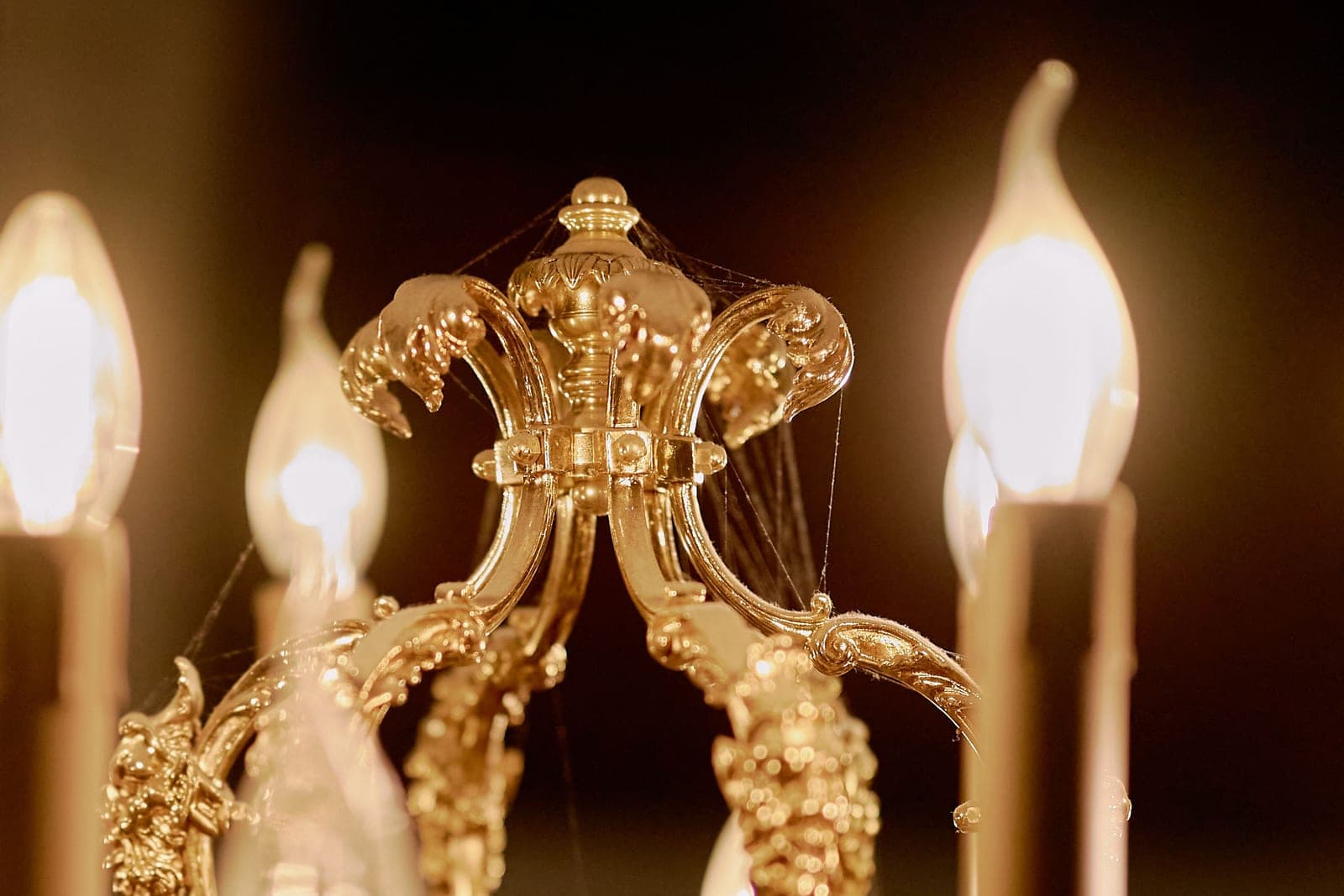 Small candle-shaped LED bulbs in a chandelier