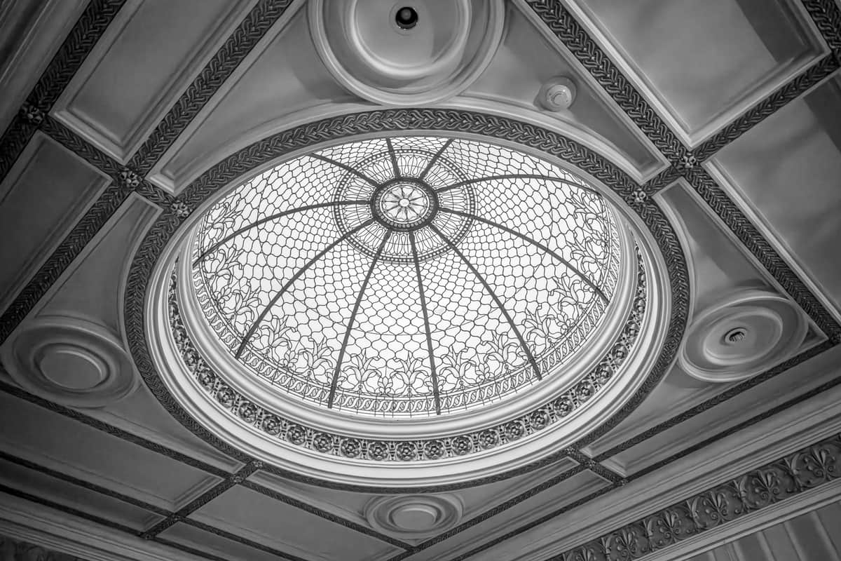 A ceiling fixture with an enclosed glass dome