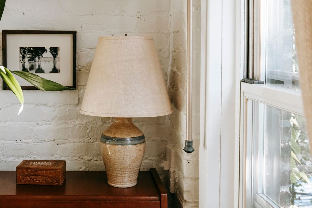 A compact floor lamp in a small apartment corner